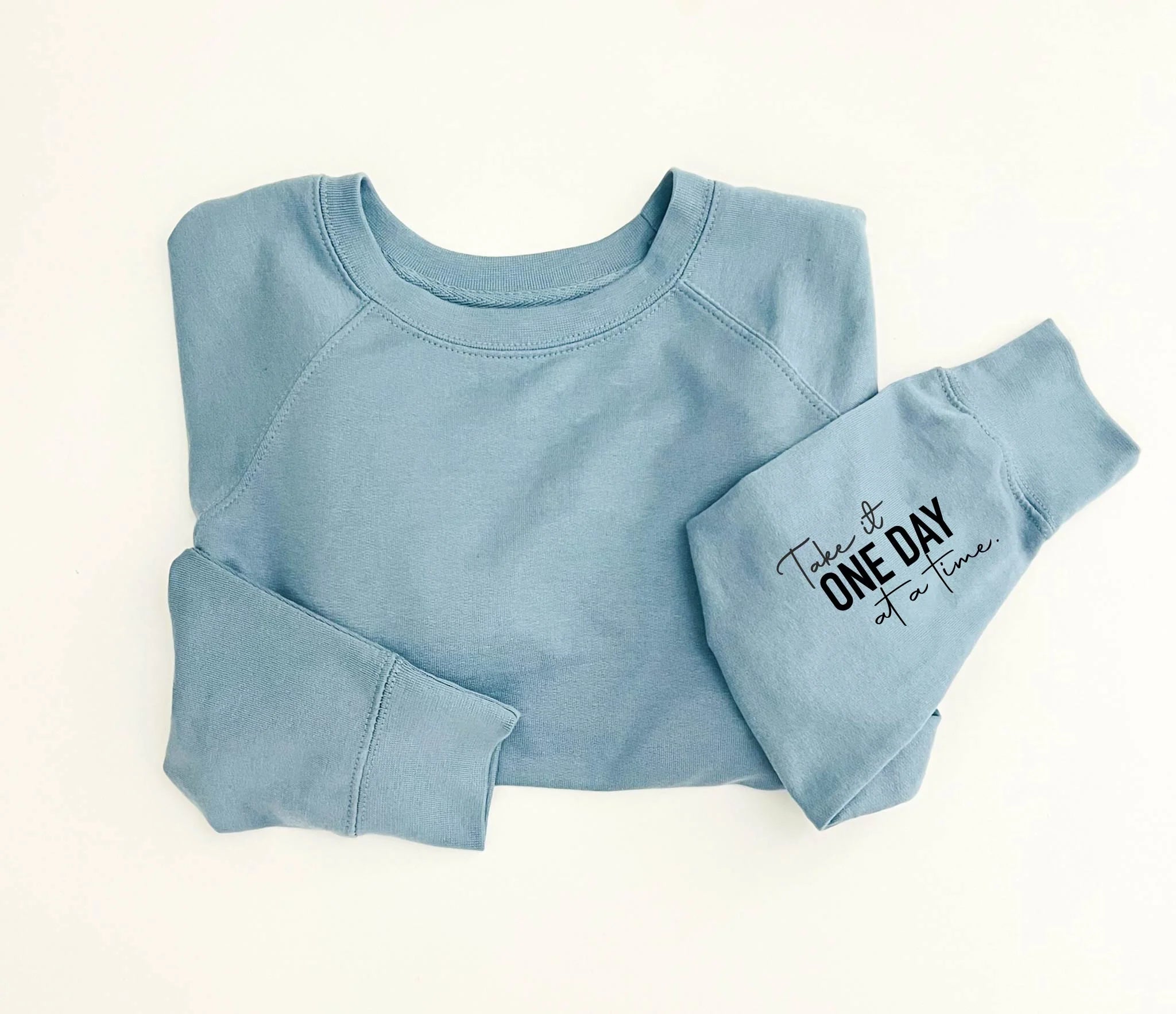 One Day at a Time Sleeve Print French Terry Pullover